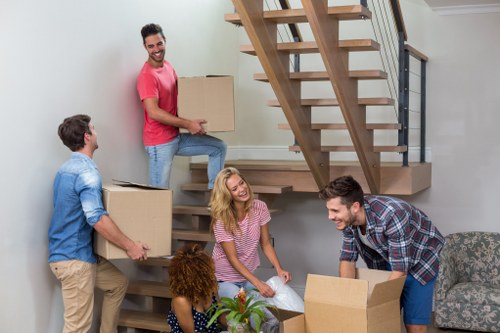 Office furniture and equipment being moved on short notice in Putney