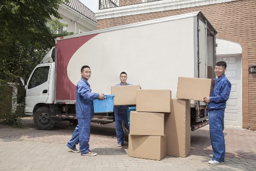 Putney Movers team loading furniture with safety precautions