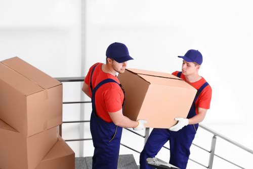 Loading furniture and boxes into a van in Putney