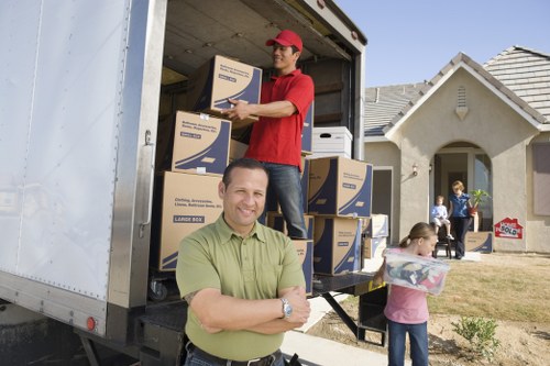 Movers using protective equipment during a relocation