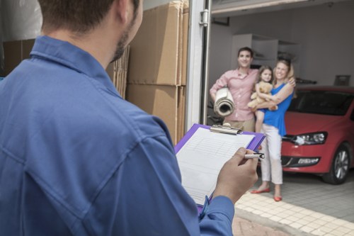 Packed boxes and household items ready for urgent removal