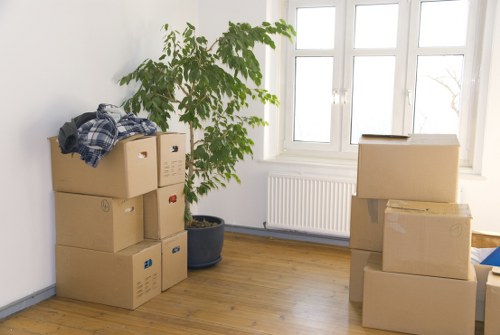 Preparing boxes and belongings for house removals in Putney