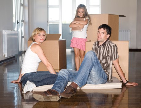 Packed moving boxes ready for a local move in Putney